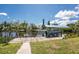 This property boasts a dock with a boat lift, providing easy access to waterways for boating and recreation at 3420 Santa Clara Dr, Punta Gorda, FL 33983