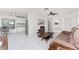 Cozy living space with open layout, seamlessly connecting the living room, dining area, and kitchen at 3420 Santa Clara Dr, Punta Gorda, FL 33983