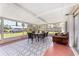 Enclosed patio with seating area and view of the canal with boats at 3420 Santa Clara Dr, Punta Gorda, FL 33983
