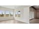Spacious bedroom with large windows and views of the surrounding landscape at 35280 Big Hawk Ln, Zephyrhills, FL 33541