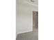 Bedroom featuring carpet, white walls, and white trim at 35571 Stableton Ln, Zephyrhills, FL 33541