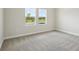 Bedroom with carpet and natural light from window at 35571 Stableton Ln, Zephyrhills, FL 33541