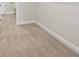 Bedroom with neutral carpet, baseboard, and walls at 35579 Stableton Ln, Zephyrhills, FL 33541