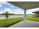 Relaxing patio with a view of the pond at 35579 Stableton Ln, Zephyrhills, FL 33541