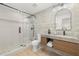 Modern bathroom with decorative tile, a glass-enclosed shower, floating vanity, and stylish fixtures at 3801 Dr Martin Luther King Jr N St, St Petersburg, FL 33703