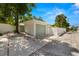 View of the property's detached garage on a quiet street with a secure entrance at 3801 Dr Martin Luther King Jr N St, St Petersburg, FL 33703