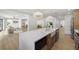 Bright, open kitchen with a large island, quartz countertops, farmhouse sink, and modern pendant lighting at 3801 Dr Martin Luther King Jr N St, St Petersburg, FL 33703