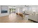 Bright open-concept living room with comfortable seating and access to outdoor patio at 3801 Dr Martin Luther King Jr N St, St Petersburg, FL 33703