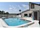 A community pool at 420 Moorings Cove Dr # 420, Tarpon Springs, FL 34689