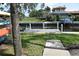 Community's waterfront dock and water access featuring a boat lift at 420 Moorings Cove Dr # 420, Tarpon Springs, FL 34689
