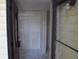 Bare entryway with an open door, showing a blank slate ready for customization at 420 Moorings Cove Dr # 420, Tarpon Springs, FL 34689