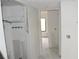 Hallway view of utility room ready for finishes, providing convenient access to a closet space at 420 Moorings Cove Dr # 420, Tarpon Springs, FL 34689