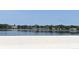 Beautiful waterfront view featuring a calm lake and blue skies, perfect for relaxing and enjoying nature at 420 Moorings Cove Dr # 420, Tarpon Springs, FL 34689