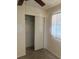Cozy bedroom with a ceiling fan, closet with sliding doors, and a window for natural light at 4506 Eden Rock Rd, Tampa, FL 33634
