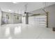 Spacious three car garage with room for storage and an automatic door opener at 4522 Majestic Hills Loop, Brooksville, FL 34601