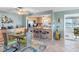 Dining area with kitchen island and breakfast bar at 4700 Cove Cir # 301, St Petersburg, FL 33708