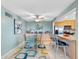 Dining area features a kitchen island with counter seating at 4700 Cove Cir # 301, St Petersburg, FL 33708