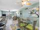 Open-concept living and dining area with comfortable seating and natural light at 4700 Cove Cir # 301, St Petersburg, FL 33708
