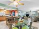Bright living room featuring an open floorplan and glass table at 4700 Cove Cir # 301, St Petersburg, FL 33708