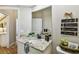 Charming bathroom featuring a granite countertop, framed mirror, and decorative accents at 5027 Cross Pointe Dr, Oldsmar, FL 34677