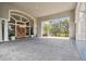 Grand clubhouse entrance with ornate wood doors and ample parking at 5027 Cross Pointe Dr, Oldsmar, FL 34677