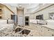 Kitchen featuring granite countertops, stainless appliances, double sink, white cabinets, and wood flooring at 5027 Cross Pointe Dr, Oldsmar, FL 34677