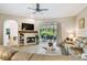 Open floor plan from the living room through to the kitchen and the outdoor pool area at 5027 Cross Pointe Dr, Oldsmar, FL 34677