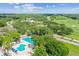 This aerial view highlights the inviting pool and lounge area at 5027 Cross Pointe Dr, Oldsmar, FL 34677