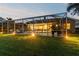 Evening view of pool and lanai showing the outdoor living space of the residence at 5027 Cross Pointe Dr, Oldsmar, FL 34677