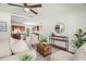 Airy open-concept living space seamlessly connects to kitchen with modern appliances and warm cabinetry at 5302 44Th N Ave, St Petersburg, FL 33710