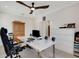 Bright office with ceiling fan, a large desk, and lots of storage at 5410 Morey Farms Loop, Palmetto, FL 34221