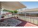 Inviting covered back deck with decorative railing, providing a relaxing outdoor living space at 6036 110Th N Ave, Pinellas Park, FL 33782