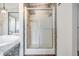 Bathroom featuring soaking tub, glass shower, and decorative tile work at 6036 110Th N Ave, Pinellas Park, FL 33782