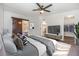 Beautifully staged main bedroom with ensuite bathroom and walk in closet at 6036 110Th N Ave, Pinellas Park, FL 33782