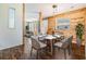 Stylish dining room featuring hardwood floors and views into a bright living area at 6036 110Th N Ave, Pinellas Park, FL 33782