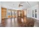 Bright and open living area boasts hardwood floors, skylights, and ample natural light at 6036 110Th N Ave, Pinellas Park, FL 33782