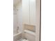 Bathroom including shower over tub and built in storage at 6201 Amaretto Ln # 6201, Tampa, FL 33634