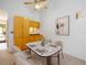 Elegant dining room with modern table set, built-in cabinet, and contemporary decor at 6201 Amaretto Ln # 6201, Tampa, FL 33634