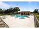 Community pool with chairs and tables for resident use at 6201 Amaretto Ln # 6201, Tampa, FL 33634