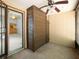 This is a view inside the screened porch with door to outside and entrance to interior of home at 6201 Amaretto Ln # 6201, Tampa, FL 33634