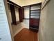 Walk-in closet with custom shelving and drawers, providing ample storage space at 622 Seascape Way, Tampa, FL 33602