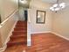 Dining room featuring hardwood floors and a classic chandelier at 622 Seascape Way, Tampa, FL 33602