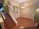 Dining room featuring hardwood floors and a classic chandelier at 622 Seascape Way, Tampa, FL 33602