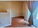 Living room with slider to deck, hardwood floors, and neutral walls at 622 Seascape Way, Tampa, FL 33602