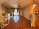 Living room with hardwood floors, overhead lighting, and sliders to the deck at 622 Seascape Way, Tampa, FL 33602