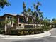 Island Walk Private Residences sign with palm trees and well-maintained landscaping at 622 Seascape Way, Tampa, FL 33602