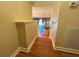Wood staircase leading to the home's lower level and open-concept living area at 622 Seascape Way, Tampa, FL 33602
