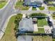 An aerial view showing a home with a well-maintained lawn and outdoor lounge area at 656 40Th Ne Ave, St Petersburg, FL 33703