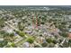 Overhead view of residential area featuring well-maintained homes and mature landscaping on a sunny day at 656 40Th Ne Ave, St Petersburg, FL 33703