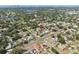 An aerial view showcasing a quiet neighborhood, displaying lush greenery and well-maintained streets at 656 40Th Ne Ave, St Petersburg, FL 33703